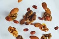 Nuts in the air on a white background, flying nuts. Healthy Brain Food, Diet, Protein, Almonds, walnuts and hazelnuts Royalty Free Stock Photo