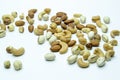 nuts almonds cashew hazelnuts scattered on white background