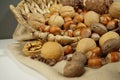 Nuts in a basket. beautiful still life close-up on a dark background. Royalty Free Stock Photo