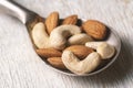Nuts in silver spoon