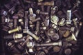 Nuts Bolts Background. lots metal bolts. tinted photo Royalty Free Stock Photo