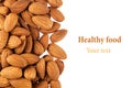 Nuts border of almonds on white background. Royalty Free Stock Photo