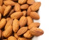 Nuts border of almonds on white background. Royalty Free Stock Photo