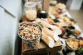 Nuts in bucket on a wedding buffet table snacks