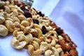 Nuts: cashews, almonds, hazelnuts and dried cranberries Royalty Free Stock Photo