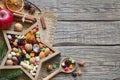 Nuts And Dried Fruits Mix For Christmas On Wooden Boards Background
