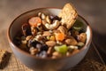 Nuts and dried fruits, oat biscuits in bowl, products for boost immunity system and healthy lifestyle breakfast