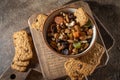 Nuts and dried fruits, oat biscuits in bowl, products for boost immunity system and healthy lifestyle, horizontal