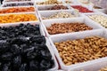 Nuts and dried fruits. Rows of dried dates, apricots, nuts, prunes and figs. Royalty Free Stock Photo