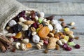 Nuts And Dried Fruits On Vintage Wooden Boards
