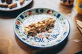 nuts-free granola bar on a ceramic plate Royalty Free Stock Photo