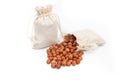 Nuts hazelnut in a bag on a white background