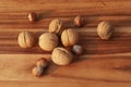 Nuts hazelnuts and walnut on wooden table