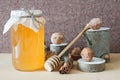 Honey, walnut, cinnamon, sawed wood. Royalty Free Stock Photo