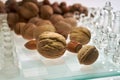 Nuts improve brain efficiency visualization - chess, chessboard with nuts Royalty Free Stock Photo