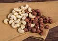 Nuts with napkina on wooden background