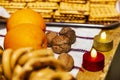 Nuts, oranges and pretzel on a Christmas table