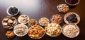 Nuts, seeds and dried fruits on the table Royalty Free Stock Photo