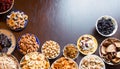 Nuts, seeds and dried fruits on the table Royalty Free Stock Photo