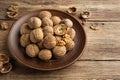 Nuts. Walnut kernels and whole walnuts Royalty Free Stock Photo