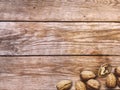 Nuts. Whole and shelled walnuts on wood background Royalty Free Stock Photo