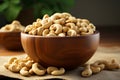 Nutty delight Cashews in a wooden bowl over burlap fabric