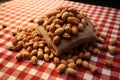 Nutty elegance Peanuts arranged tastefully on a rustic wrapping cloth