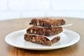 Nutty fudge brownie cake on wooden table