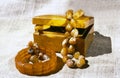 Nutwood casket and amber adornment
