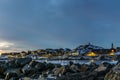 Nuuk city old harbor sunset view with stones and icebergs, Green