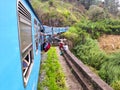 Nuwara Eliya, Sri Lanka, February 9, 2019: Tourists on the train from Kandy to Nuwara Eliya, outside the window. One of the best