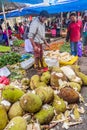 NUWARA ELIYA, SRI LANKA - JULY 17, 2016: Jackfruit seller at the produce market in Nuwara Eliya tow Royalty Free Stock Photo