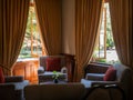 Nuwara Eliya, Sri Lanka - March 10, 2022: Interior of the Grand Hotel built in colonial style. Relaxation area for guests with