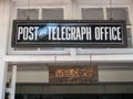 Nuwara Eliya, Sri Lanka - March 10, 2022: Sign above the entrance to the old post office built in the 19th century by the British Royalty Free Stock Photo