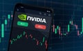 nvidia logo on mobile phone screen company shares rise or fall on stock exchange market Royalty Free Stock Photo