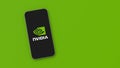 Nvidia Logo on Mobile Phone Screen on Green Background with Copy Space