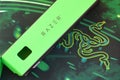 Razer Goliathus Speed Gaming green mouse pad and box with logo. Razer global gaming hardware manufacturing company, as well as an
