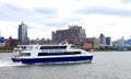 NY Waterway catamaran The Molly Pitcher on the Hudson River with Manhattan in the background.