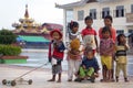 Nyaungshwe Inle Lake, Burma - December 4, 2012. Portrait of Burman children different age in colorful clothes with toys