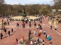 New York City, New York - March 24, 2019: People enjoying a sunny and warm day at Bethesda Fountain in Central Park, New York Royalty Free Stock Photo