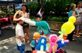 NYC:Clown Making Balloon Hats at Street Fair