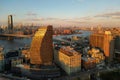 NYC from drone. Brooklyn Midtown skyline at dusk over Hudson River, NYC. Aerial Brooklyn Bridge in NYC. Top view of Royalty Free Stock Photo