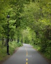 NYC greenway bike path through Fort Washington Park on a dark au Royalty Free Stock Photo