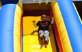 NYC: Little Boy on Plastic Slide