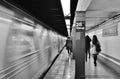 NYC People Commuting to Work on MTA Subway Train City Woman Walking Royalty Free Stock Photo