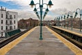 NYC subway platform looking at arriving train Royalty Free Stock Photo