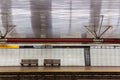 NYC subway station and bench Royalty Free Stock Photo