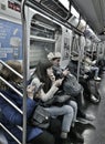 NYC Subway Train Person Looking at Smart Phone