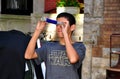 NYC: Teenaged boy with toy telescope Royalty Free Stock Photo