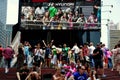 NYC: Tourists with Animatronic Billboard in Times Square